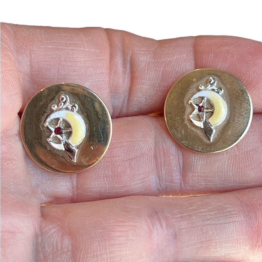 SWANK Gold and Silver Skull Earrings